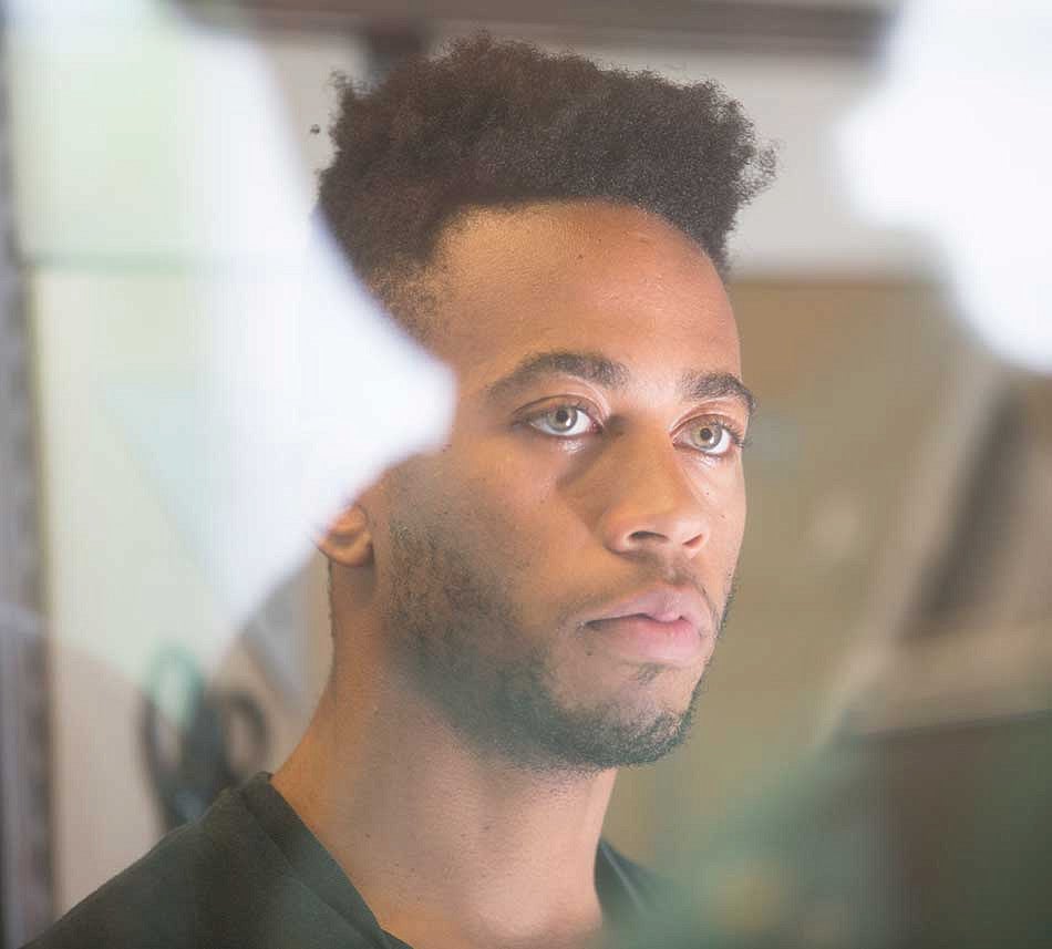 Portrait of a male student looking away from the camera Portrait of a male student looking away from the camera