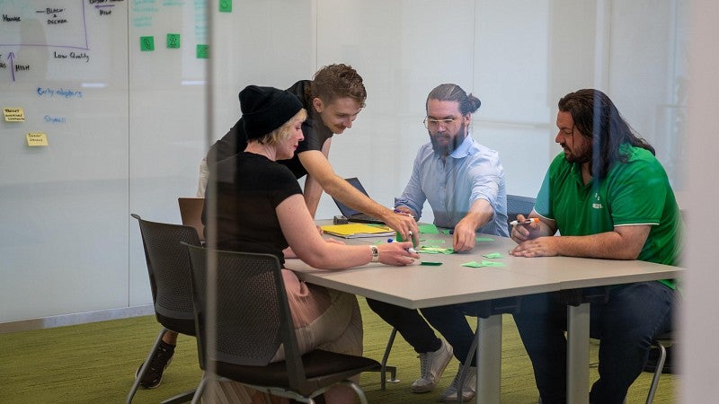 graduate students collaborate