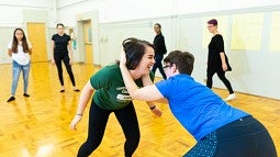 UO students taking a self defense class